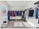 Walk-in closet with an abundance of storage space and natural light at 107 Gray Willow St, Mooresville, NC 28117