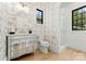 Charming bathroom with decorative wallpaper, mirrored vanity, and glass enclosed shower with black trim windows at 4142 Pineview Rd, Charlotte, NC 28211