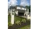 Stunning exterior featuring a modern two-story home with a well-maintained lawn and black metal fencing at 4142 Pineview Rd, Charlotte, NC 28211