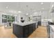Bright and airy kitchen featuring a large island, stainless steel appliances, and an open floor plan at 4142 Pineview Rd, Charlotte, NC 28211