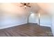 Spacious bedroom with wood-look floors and a ceiling fan at 1405 Coppergate Dr, Salisbury, NC 28147