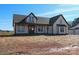 Beautiful single Gathering home with light colored siding and dark trim at 1405 Coppergate Dr, Salisbury, NC 28147