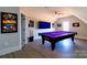 Entertaining game room with a pool table, TV, and fun decor, perfect for recreation and relaxation at 1405 Coppergate Dr, Salisbury, NC 28147