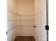 Walk-in pantry with ample shelving for storage and organization at 1405 Coppergate Dr, Salisbury, NC 28147