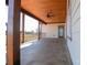 Covered porch with ceiling fan and view at 1405 Coppergate Dr, Salisbury, NC 28147