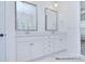 Bright bathroom showcasing a double vanity with modern fixtures and marble countertops at 106 Windbluff Ct # 163, Statesville, NC 28677