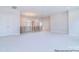 Open loft area featuring neutral carpet and plenty of natural light at 106 Windbluff Ct # 163, Statesville, NC 28677