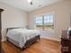 Bedroom with wood floors and a large window at 2165 Smith Rd # 9, Clover, SC 29710