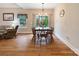 Bright dining room featuring a glass-top table and hardwood floors at 2165 Smith Rd # 9, Clover, SC 29710