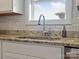 Modern kitchen sink with a pull-down faucet and granite countertop at 2165 Smith Rd # 9, Clover, SC 29710