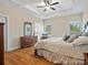 Large main bedroom with hardwood floors and an ensuite bathroom at 2165 Smith Rd # 9, Clover, SC 29710