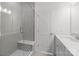 Bathroom featuring a glass-enclosed shower with bench and a modern vanity at 4210 Alexander View Dr # 38, Charlotte, NC 28226