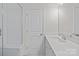 Modern bathroom featuring a sleek vanity, ample lighting, and a pristine shower area, providing a clean and contemporary feel at 4214 Alexander View Dr # 39, Charlotte, NC 28226