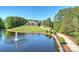 Luxury home with pond, fountain, and manicured lawn at 525 Lake Lynn Rd, Concord, NC 28025