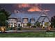 Stunning stone house exterior with fountain and manicured landscaping at 525 Lake Lynn Rd, Concord, NC 28025