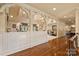 Open hallway with detailed woodwork showcasing views into the dining and living spaces at 525 Lake Lynn Rd, Concord, NC 28025