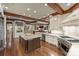 Spacious kitchen with wooden beams, stainless steel appliances, granite counters and a large island at 525 Lake Lynn Rd, Concord, NC 28025