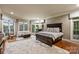 Spacious main bedroom with hardwood floors, sitting area, and large windows at 525 Lake Lynn Rd, Concord, NC 28025