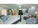 Expansive main bedroom featuring a sitting area, TV, and a large decorative mirror at 525 Lake Lynn Rd, Concord, NC 28025