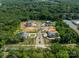 A picturesque aerial view of an upscale neighborhood surrounded by lush greenery at 8022 Litaker Manor Ct, Charlotte, NC 28270