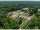 Aerial view of new luxury homes in a wooded community at 8022 Litaker Manor Ct, Charlotte, NC 28270