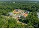 An elevated view of several new homesites nestled in a tranquil, tree-filled environment at 8022 Litaker Manor Ct, Charlotte, NC 28270