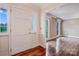 Welcoming entryway with beautiful hardwood floors and sidelight windows bringing in natural light at 218 Fairway Dr, Shelby, NC 28150