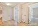 Hallway featuring tile flooring and several doorways leading to other rooms at 218 Fairway Dr, Shelby, NC 28150