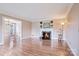 Spacious living room with a fireplace and beautiful hardwood flooring with lots of natural light at 218 Fairway Dr, Shelby, NC 28150