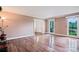 A cozy living room featuring hardwood floors, and a lamp by the windows at 218 Fairway Dr, Shelby, NC 28150