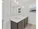 Double vanity bathroom with gray cabinets and quartz countertops at 2121 Acclaim St, Charlotte, NC 28205