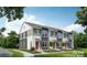 Modern townhouses with gray siding, white accents and red doors at 2121 Acclaim St, Charlotte, NC 28205