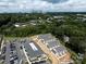 Aerial view of townhomes and parking lot with city skyline at 2125 Acclaim St, Charlotte, NC 28205