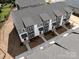 Aerial view of townhomes with gray roofs and red doors at 2125 Acclaim St, Charlotte, NC 28205