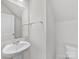 Clean bathroom with white vanity, toilet and fixtures at 2129 Acclaim St, Charlotte, NC 28205