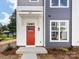 Townhome's front entrance with red door and white trim at 2129 Acclaim St, Charlotte, NC 28205