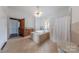 Bathroom with a jacuzzi tub and tile flooring at 404 W Kerr St, Salisbury, NC 28144