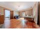 Bedroom with a bed, hardwood floors, and a work area at 404 W Kerr St, Salisbury, NC 28144