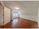 Large attic bedroom with hardwood floors and closet at 404 W Kerr St, Salisbury, NC 28144