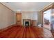 Bedroom with hardwood floors, fireplace and wooden dresser at 404 W Kerr St, Salisbury, NC 28144