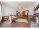 Bright bedroom with hardwood floors and antique furniture at 404 W Kerr St, Salisbury, NC 28144