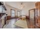 Spacious bedroom with hardwood floors and a fireplace at 404 W Kerr St, Salisbury, NC 28144