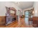 An antique buffet and piano sit in this grand entryway at 404 W Kerr St, Salisbury, NC 28144