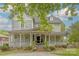 Charming two-story home with a wrap-around porch at 404 W Kerr St, Salisbury, NC 28144