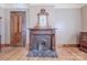 Ornate antique fireplace in a classic bedroom setting at 404 W Kerr St, Salisbury, NC 28144