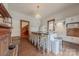 Updated kitchen with island and white cabinetry at 404 W Kerr St, Salisbury, NC 28144