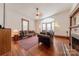 Living room with hardwood floors, bay window, and fireplace at 404 W Kerr St, Salisbury, NC 28144