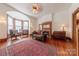 Living room features hardwood floors, fireplace, and bay window at 404 W Kerr St, Salisbury, NC 28144