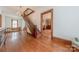 Upper hallway with hardwood floors and access to bedrooms at 404 W Kerr St, Salisbury, NC 28144