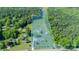 Aerial view outlining property lines, highlighting land with wooded areas at 796 Cornelius Rd, Mooresville, NC 28117